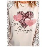 Ashlyn’s LOVE ALWAYS Hugging Hearts Graphics Animal Print Sleeves Beige Sweater Top